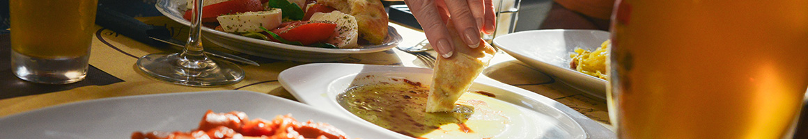 Eating Greek Mediterranean at Ammos Estiatorio restaurant in New York, NY.
